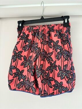 Hanna Andersson Coral Palm-Print Swim Trunks